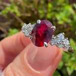 oval lab grown ruby engagement ring in platinum