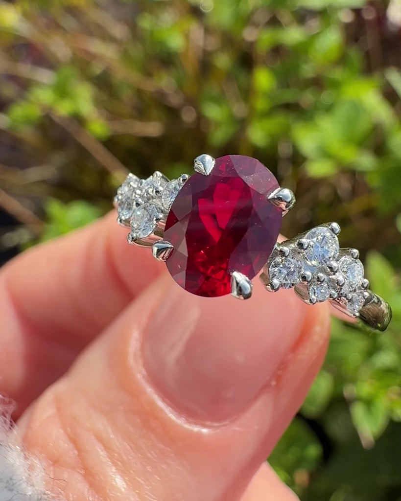 oval lab grown ruby engagement ring in platinum