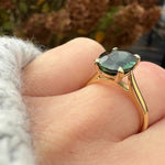 oval teal sapphire solitaire ring