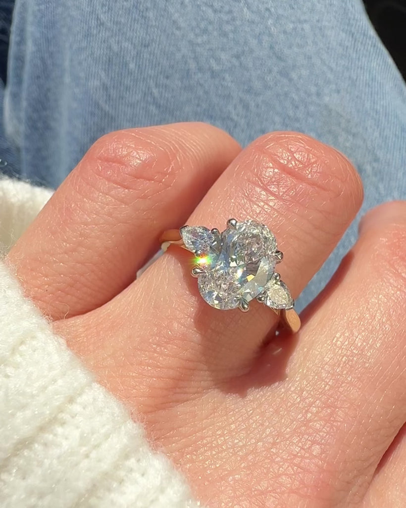 oval lab grown diamond yellow gold and platinum engagement ring