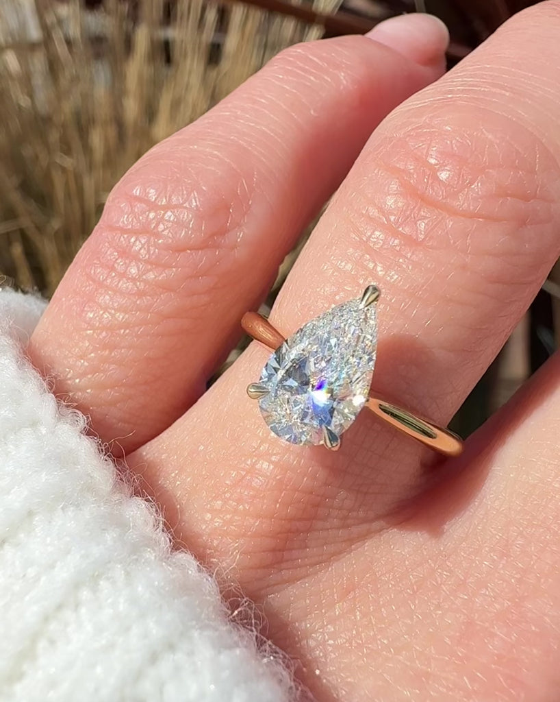 pear shape lab grown diamond yellow gold solitaire engagement ring
