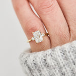 radiant cut lab grown diamond trilogy engagement ring in yellow gold