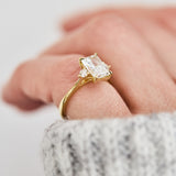 radiant cut lab grown diamond trilogy engagement ring in yellow gold