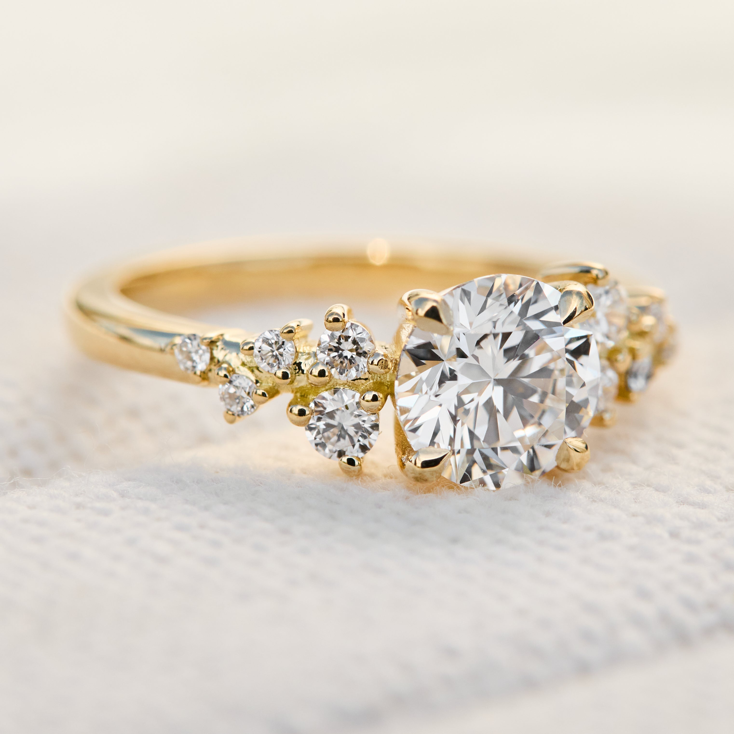 round brilliant cut lab grown diamond ring set in yellow gold