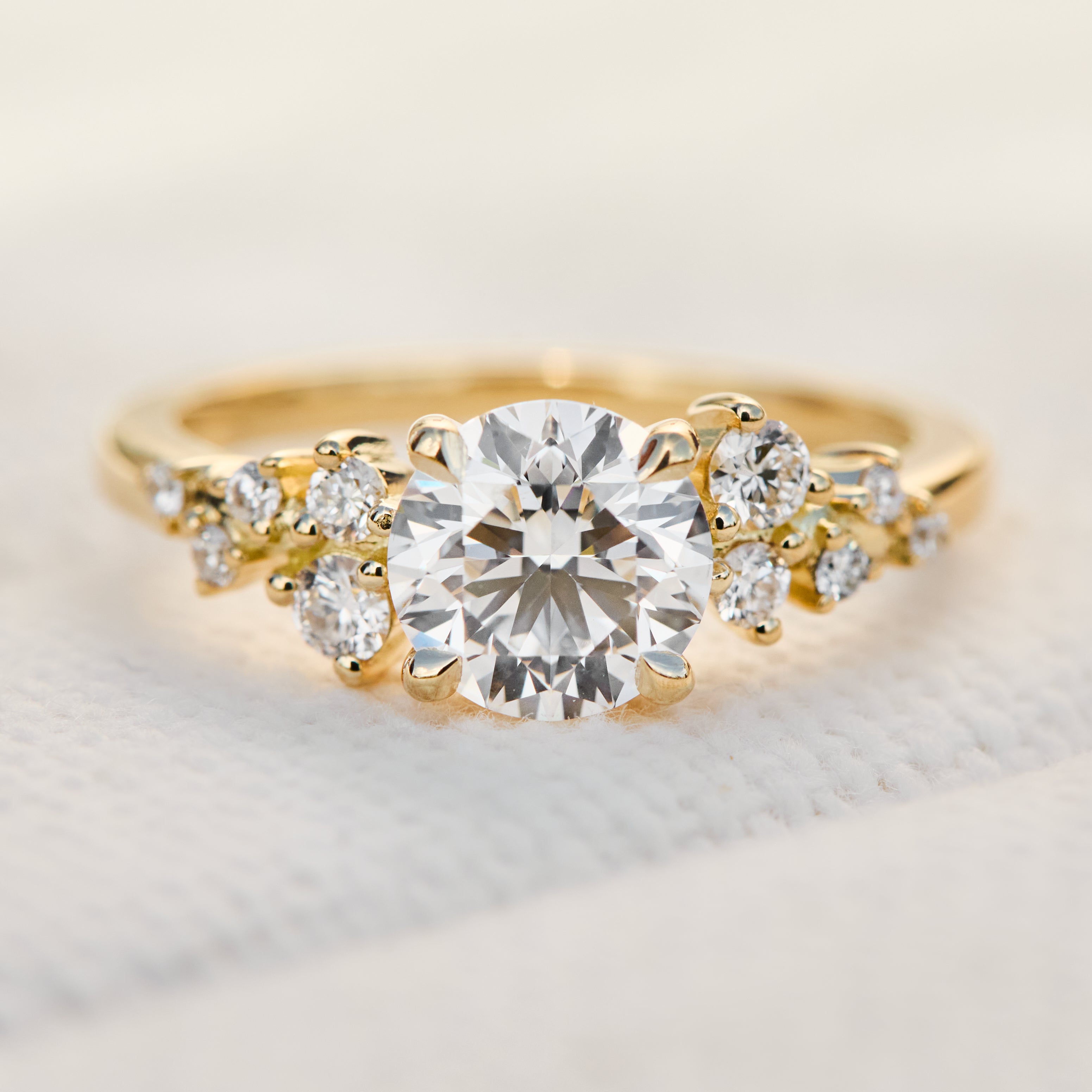 round brilliant cut lab grown diamond ring set in yellow gold