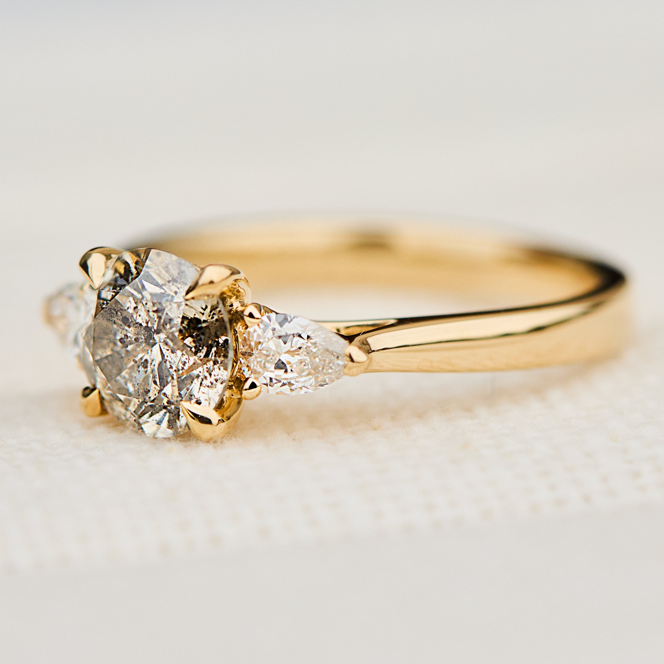 round brilliant cut salt and pepper diamond engagement ring in yellow gold