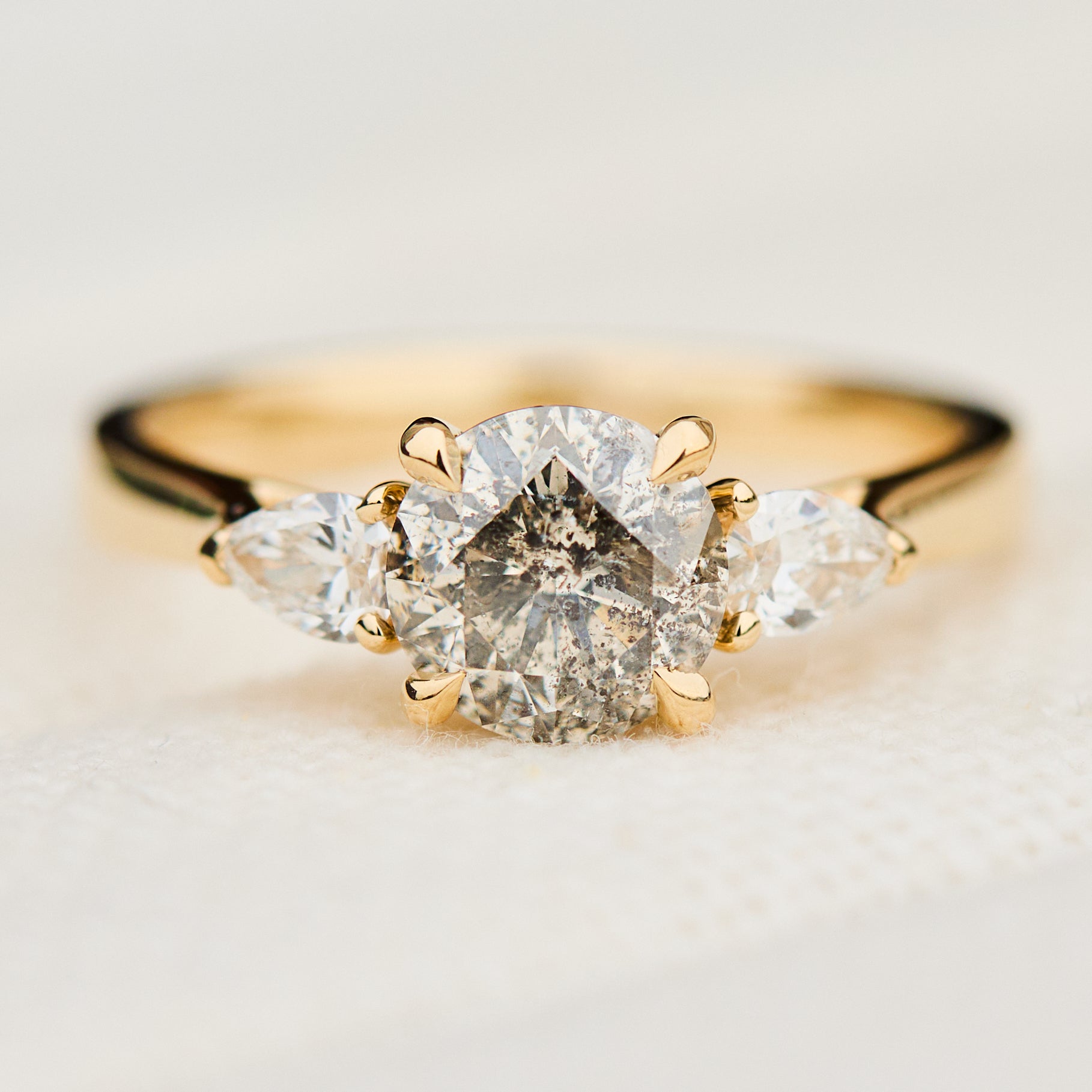 round brilliant cut salt and pepper diamond engagement ring in yellow gold
