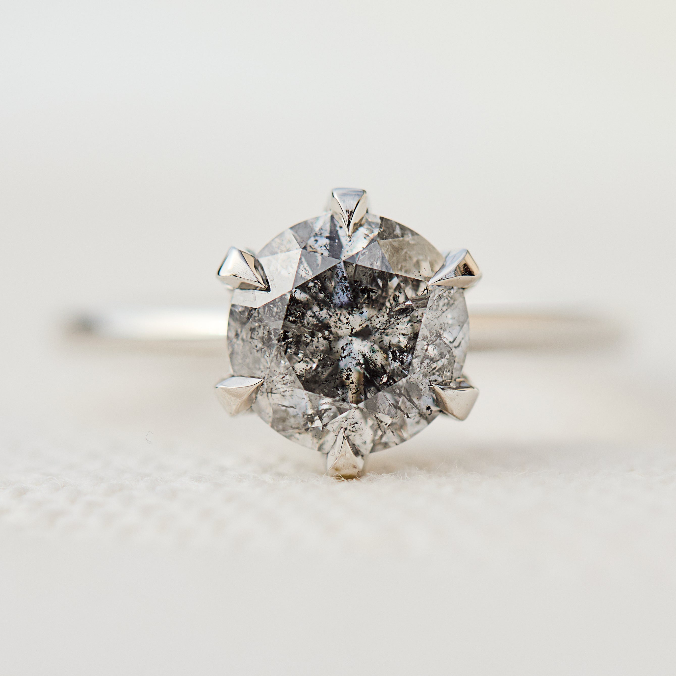 round brilliant cut salt and pepper diamond solitaire ring