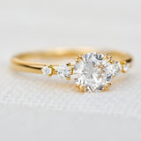 round brilliant five diamond engagement ring in yellow gold