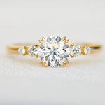 round brilliant five diamond engagement ring in yellow gold