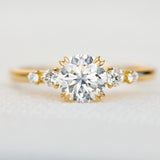 round brilliant five diamond engagement ring in yellow gold