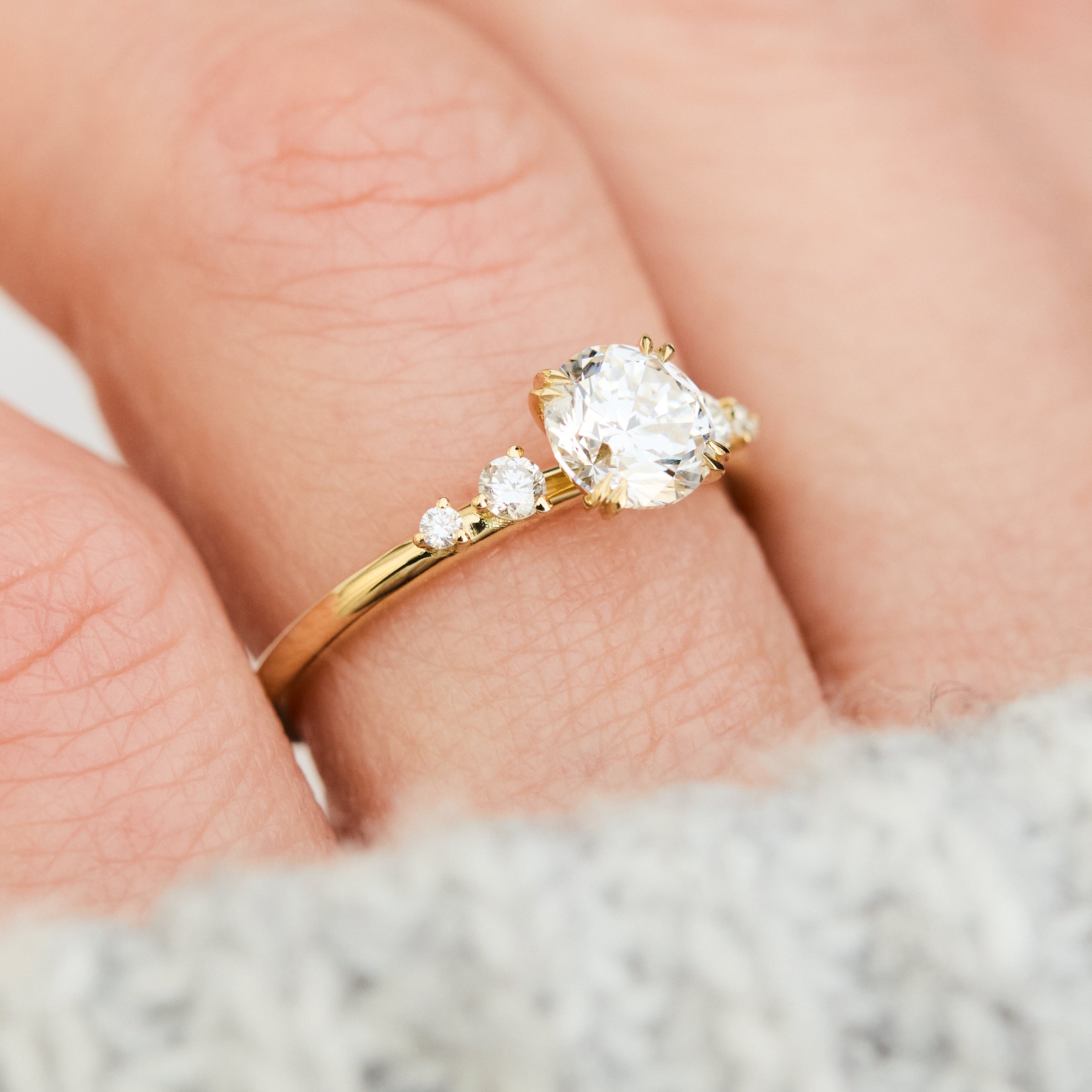 round brilliant five diamond engagement ring in yellow gold