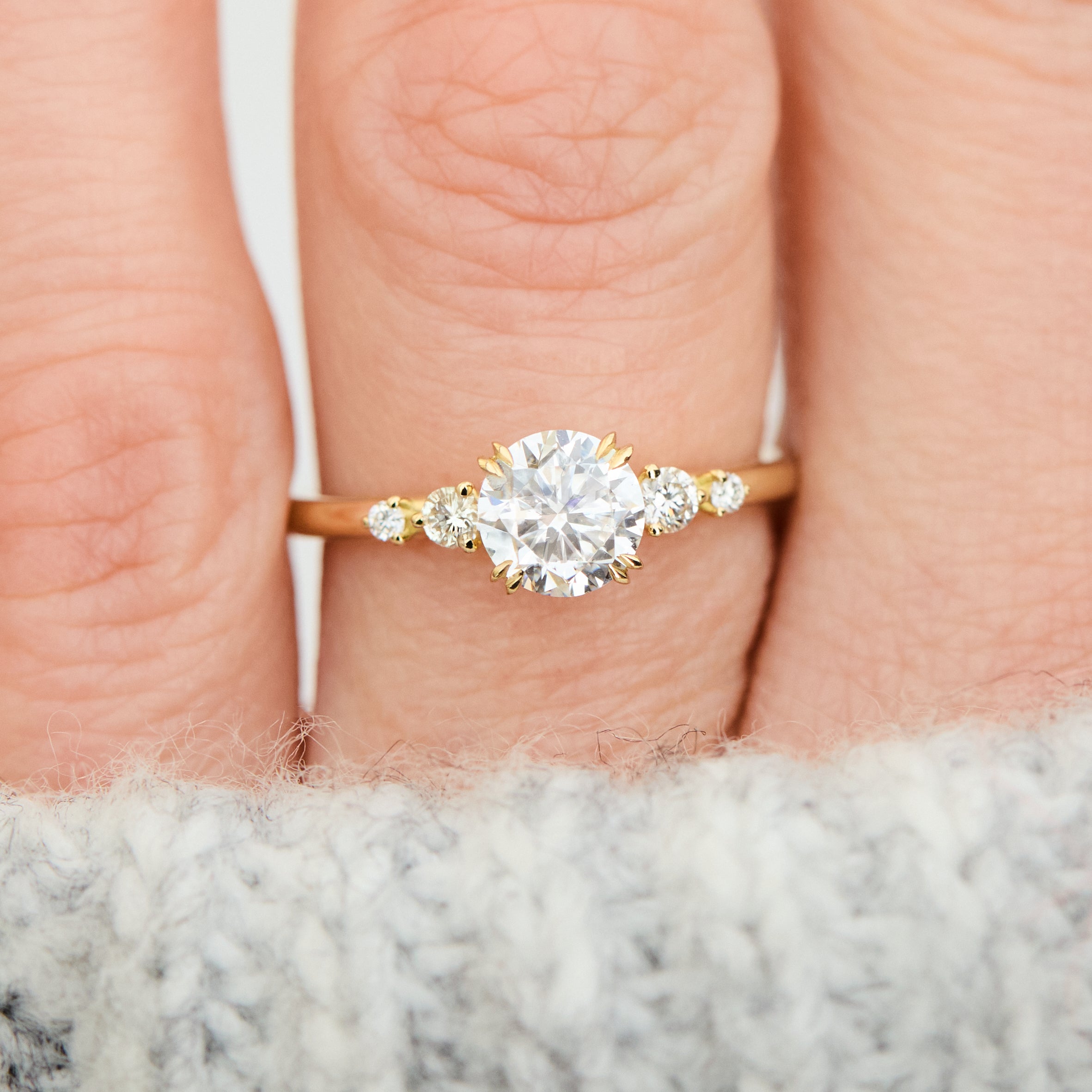 round brilliant five diamond engagement ring in yellow gold
