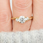 round brilliant lab grown diamond trilogy engagement ring in yellow gold