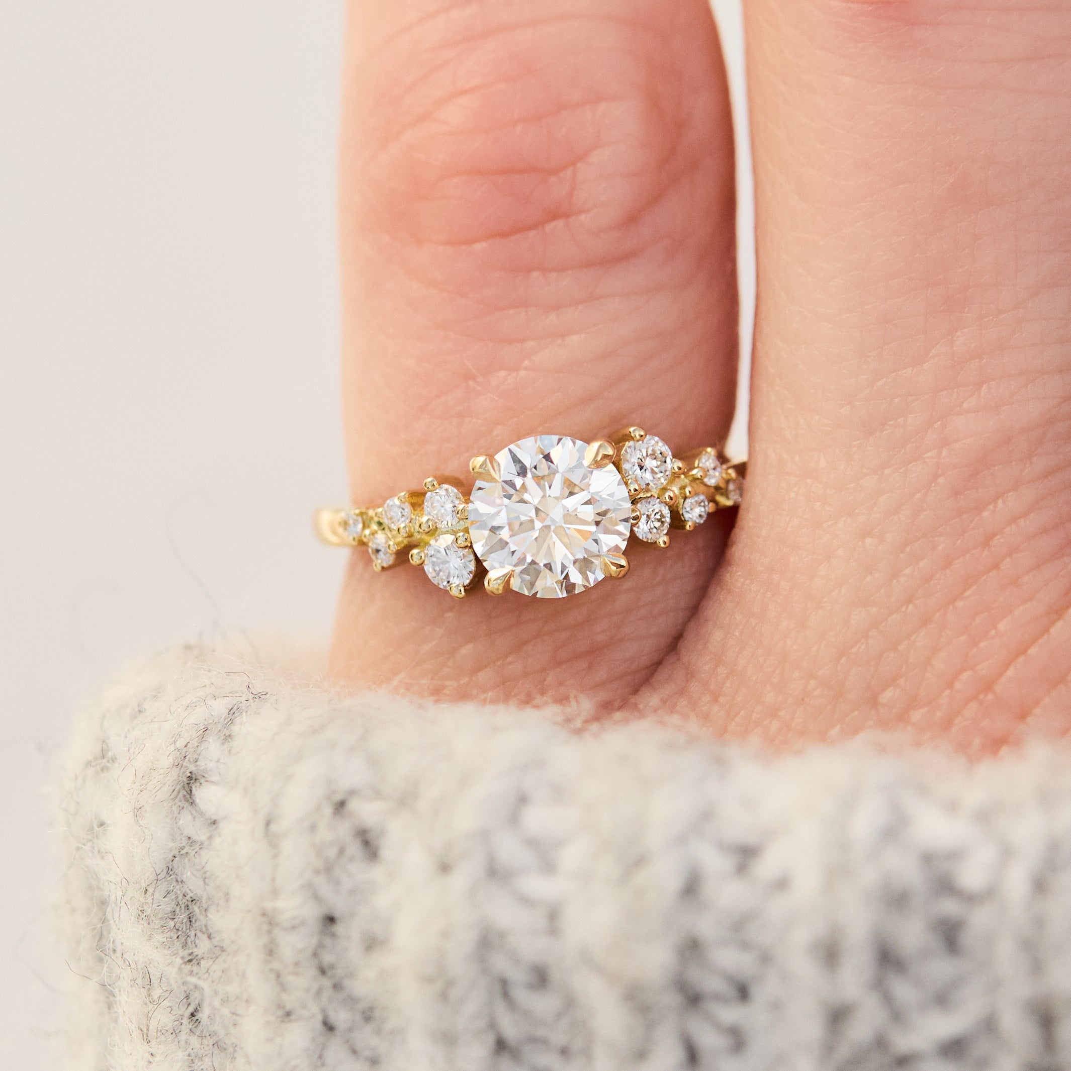 round brilliant cut lab grown diamond ring set in yellow gold