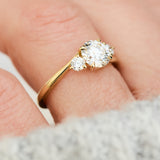 round brilliant lab grown diamond trilogy engagement ring in yellow gold