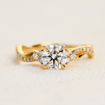 round diamond one of a kind engagement ring set in 18ct yellow gold