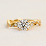 round diamond one of a kind engagement ring set in 18ct yellow gold
