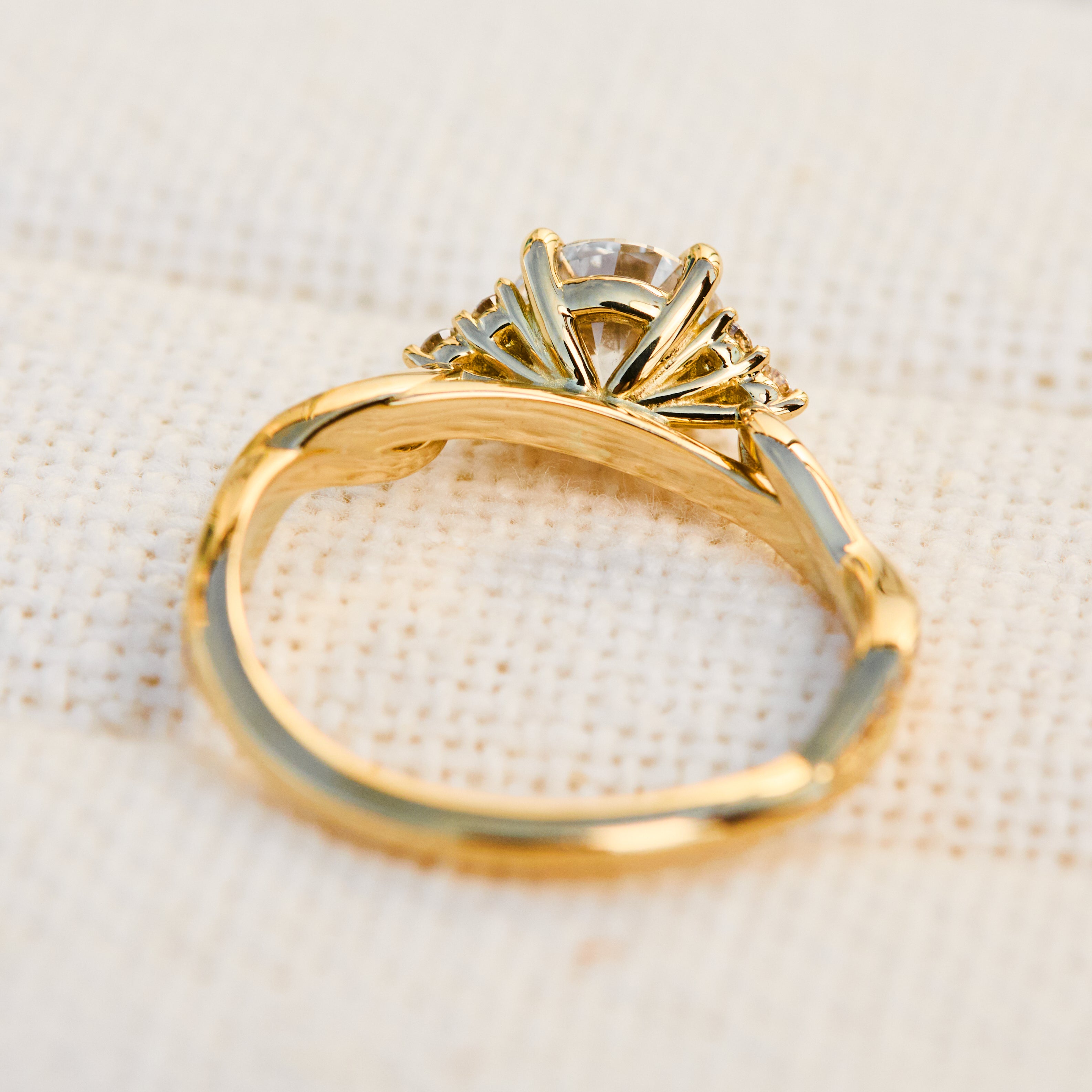 round diamond one of a kind engagement ring set in 18ct yellow gold