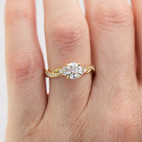 round diamond one of a kind engagement ring set in 18ct yellow gold