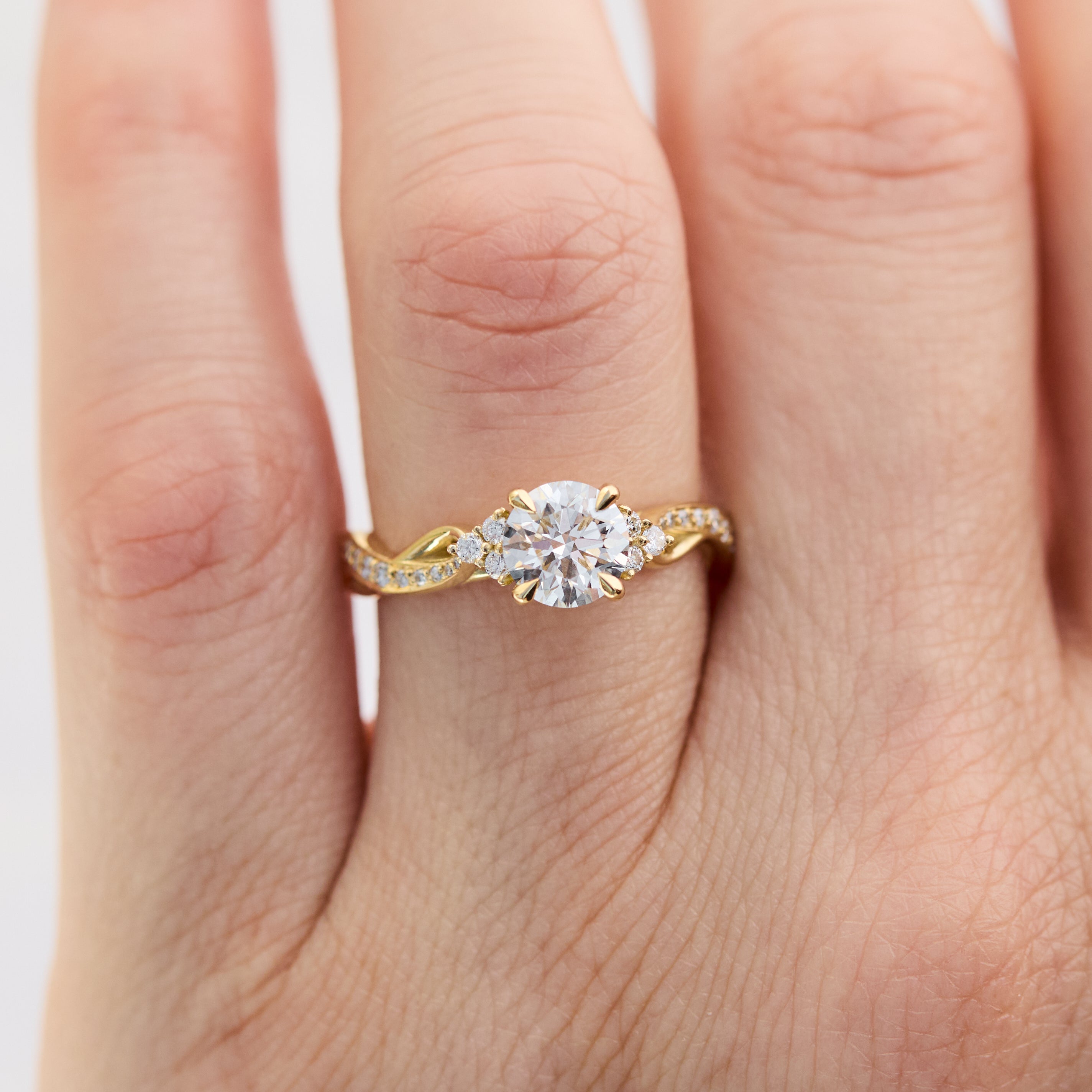 round diamond one of a kind engagement ring set in 18ct yellow gold