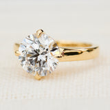 round lab grown diamond solitaire engagement ring in yellow gold
