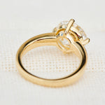 round lab grown diamond solitaire engagement ring in yellow gold