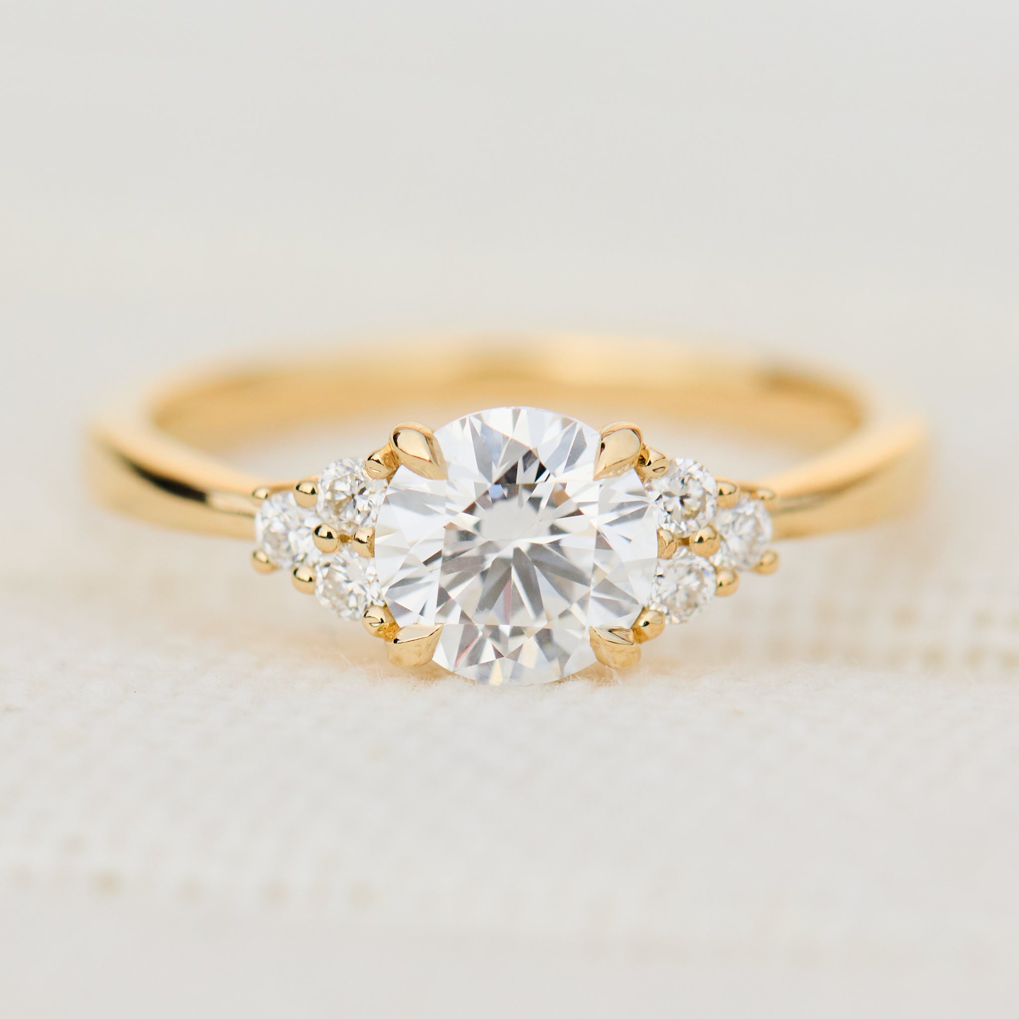 round lab grown diamond yellow gold engagement ring