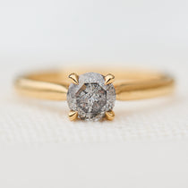 round salt and pepper solitaire ring