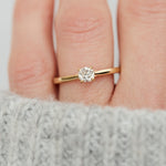salt and pepper cushion cut diamond solitaire engagement ring in yellow gold