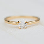 salt and pepper cushion cut diamond solitaire engagement ring in yellow gold