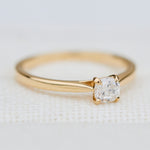 salt and pepper cushion cut diamond solitaire engagement ring in yellow gold