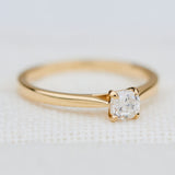 salt and pepper cushion cut diamond solitaire engagement ring in yellow gold