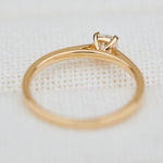 salt and pepper cushion cut diamond solitaire engagement ring in yellow gold