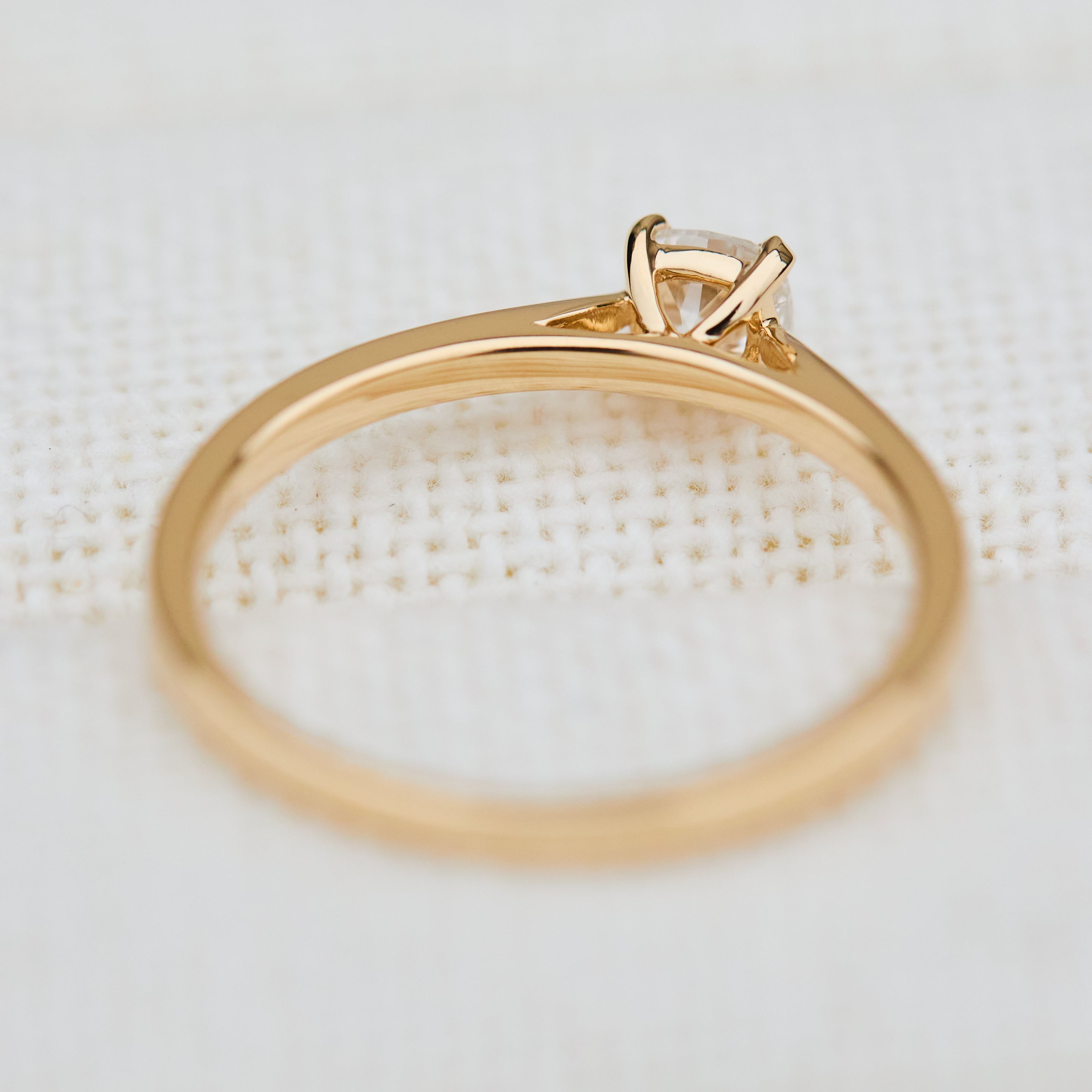 salt and pepper cushion cut diamond solitaire engagement ring in yellow gold