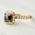 salt and pepper halo engagement ring in yellow gold
