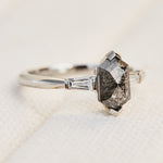 elongated hexagon salt and pepper diamond trilogy engagement ring