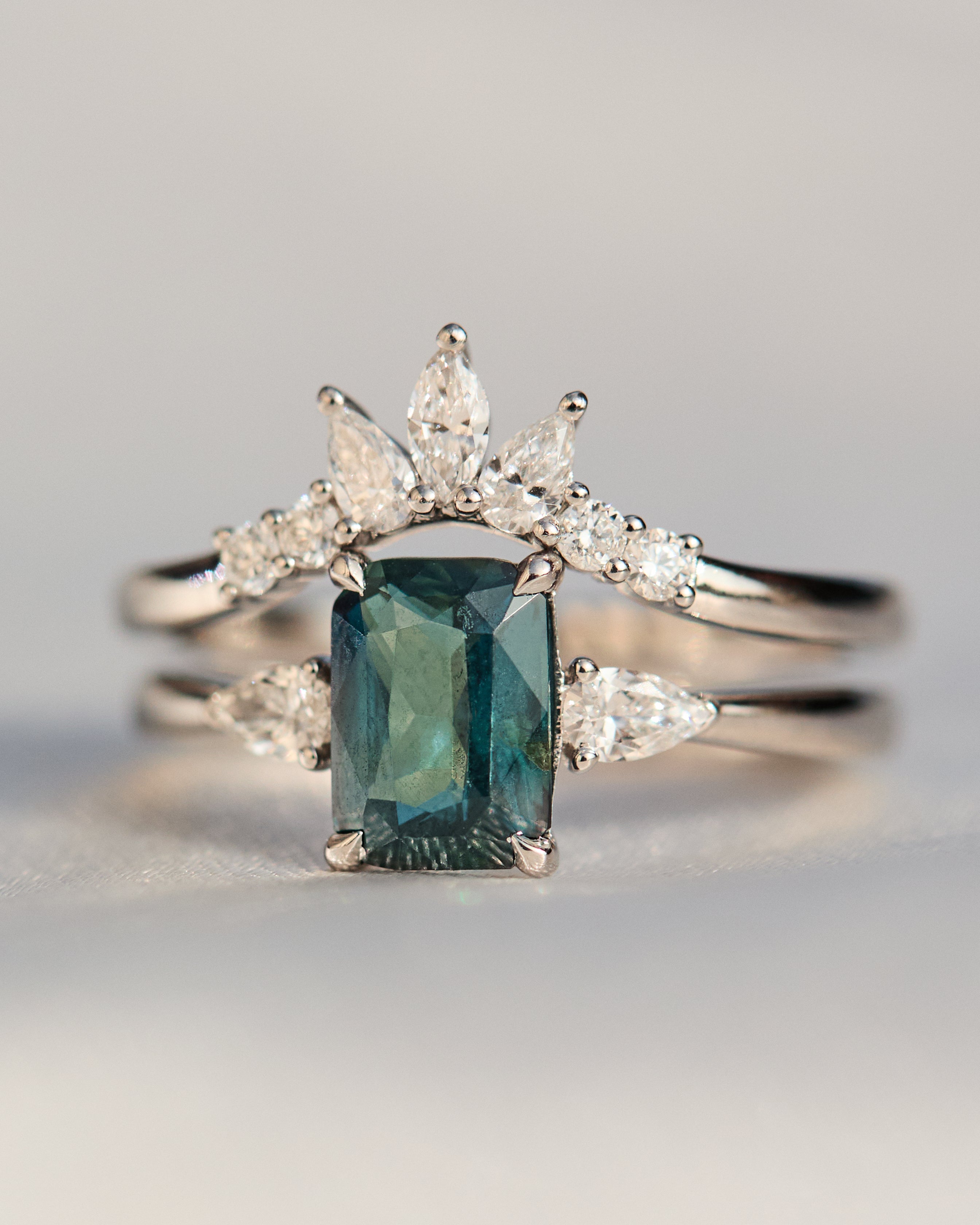 blue teal sapphire and diamond engagement ring stack