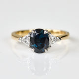 oval blue sapphire yellow gold