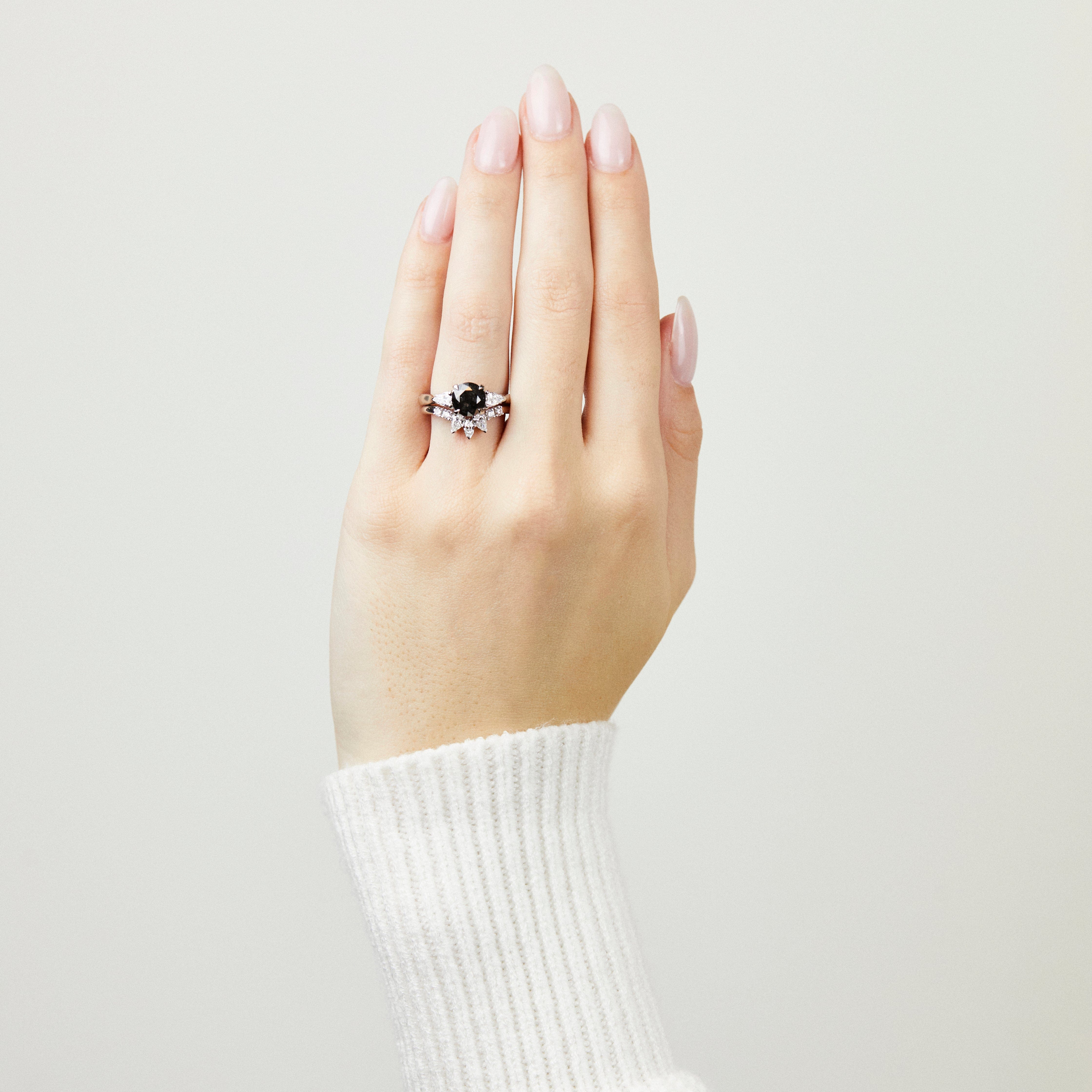 Platinum salt and pepper round brilliant cut diamond engagement trilogy ring