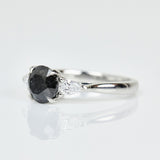 Platinum salt and pepper round brilliant cut diamond engagement trilogy ring