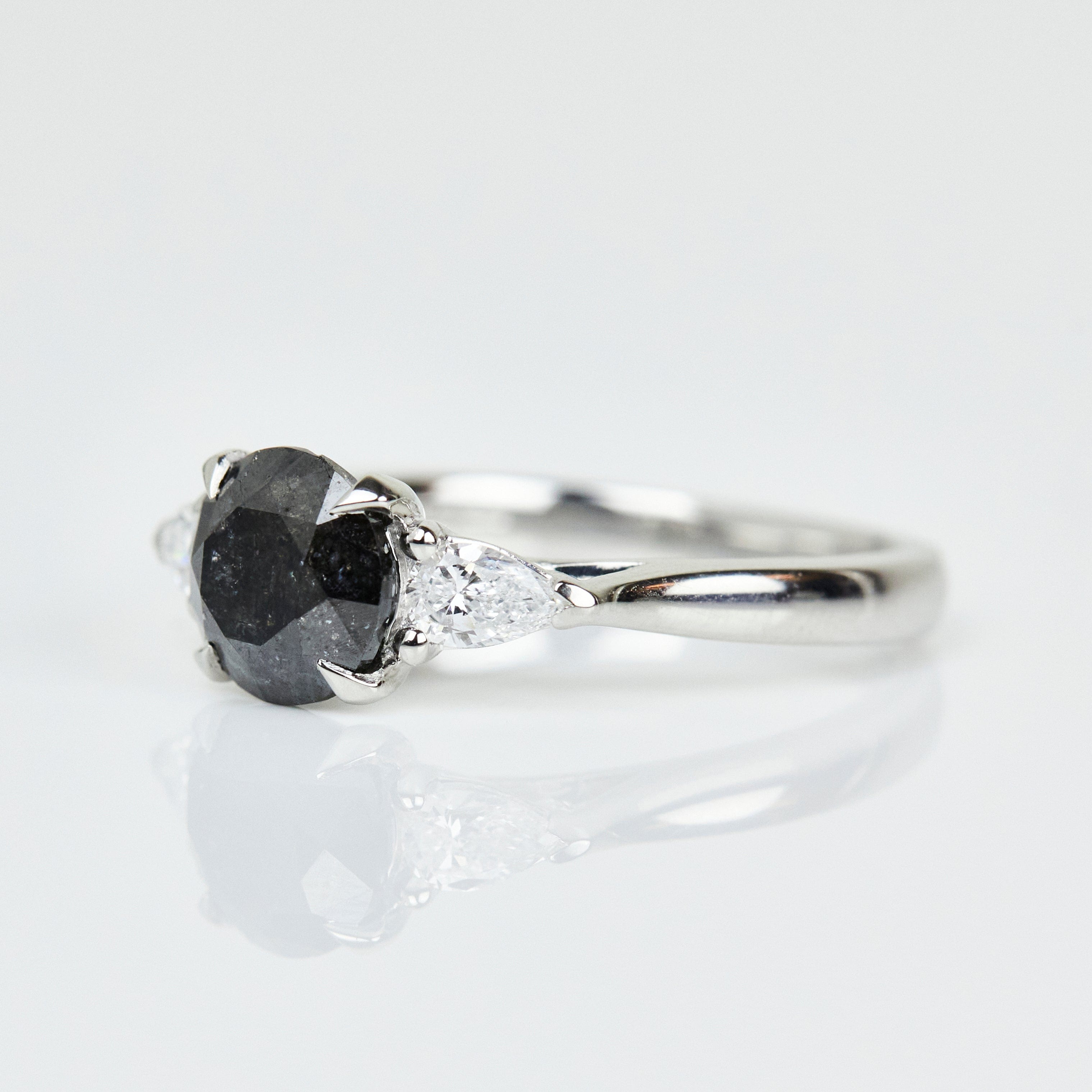 Platinum salt and pepper round brilliant cut diamond engagement trilogy ring