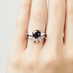 Platinum salt and pepper round brilliant cut diamond engagement trilogy ring