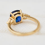 sri lankan blue sapphire trilogy engagement ring in yellow gold