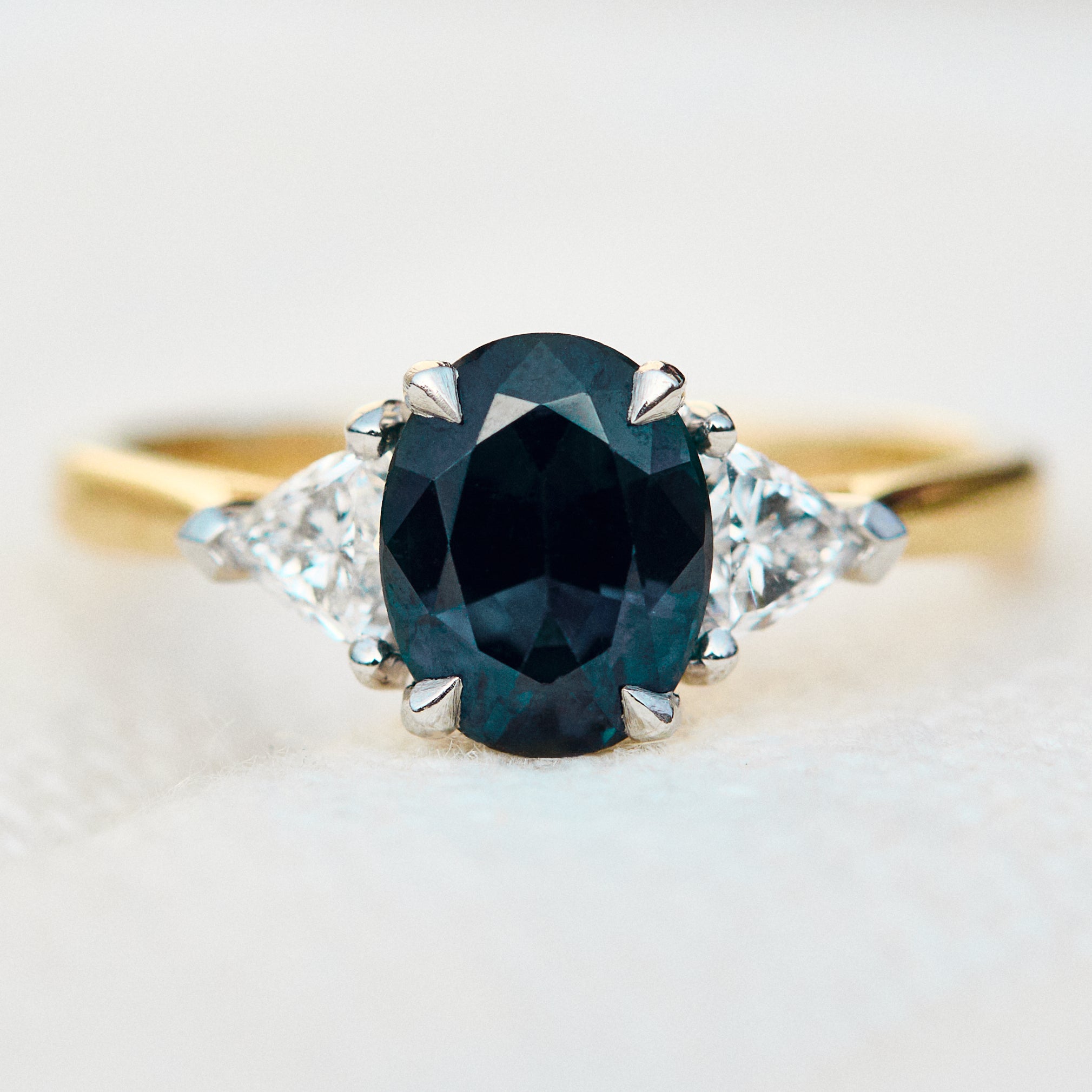 teal blue oval sapphire yellow gold and platinum engagement ring