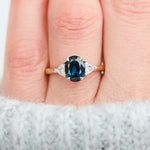 teal blue oval sapphire yellow gold and platinum engagement ring