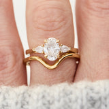 yara curved wedding band in yellow gold