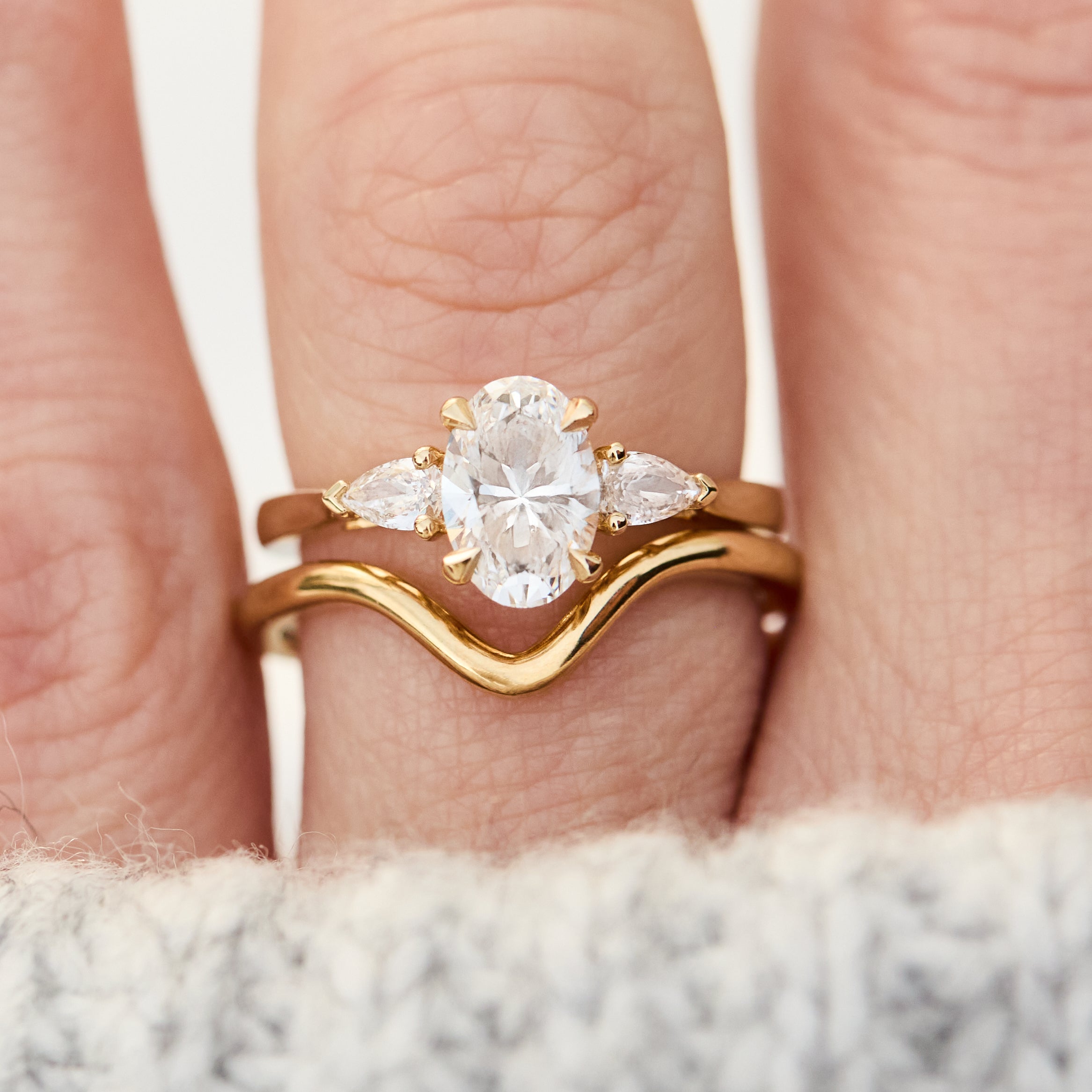 yara curved wedding band in yellow gold