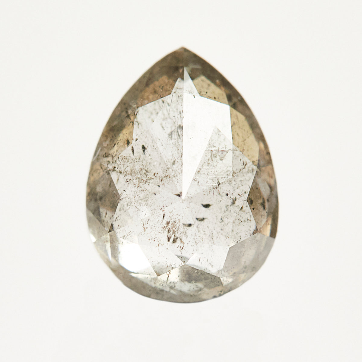 Timeless pear-shaped rose-cut loose salt and pepper diamond.