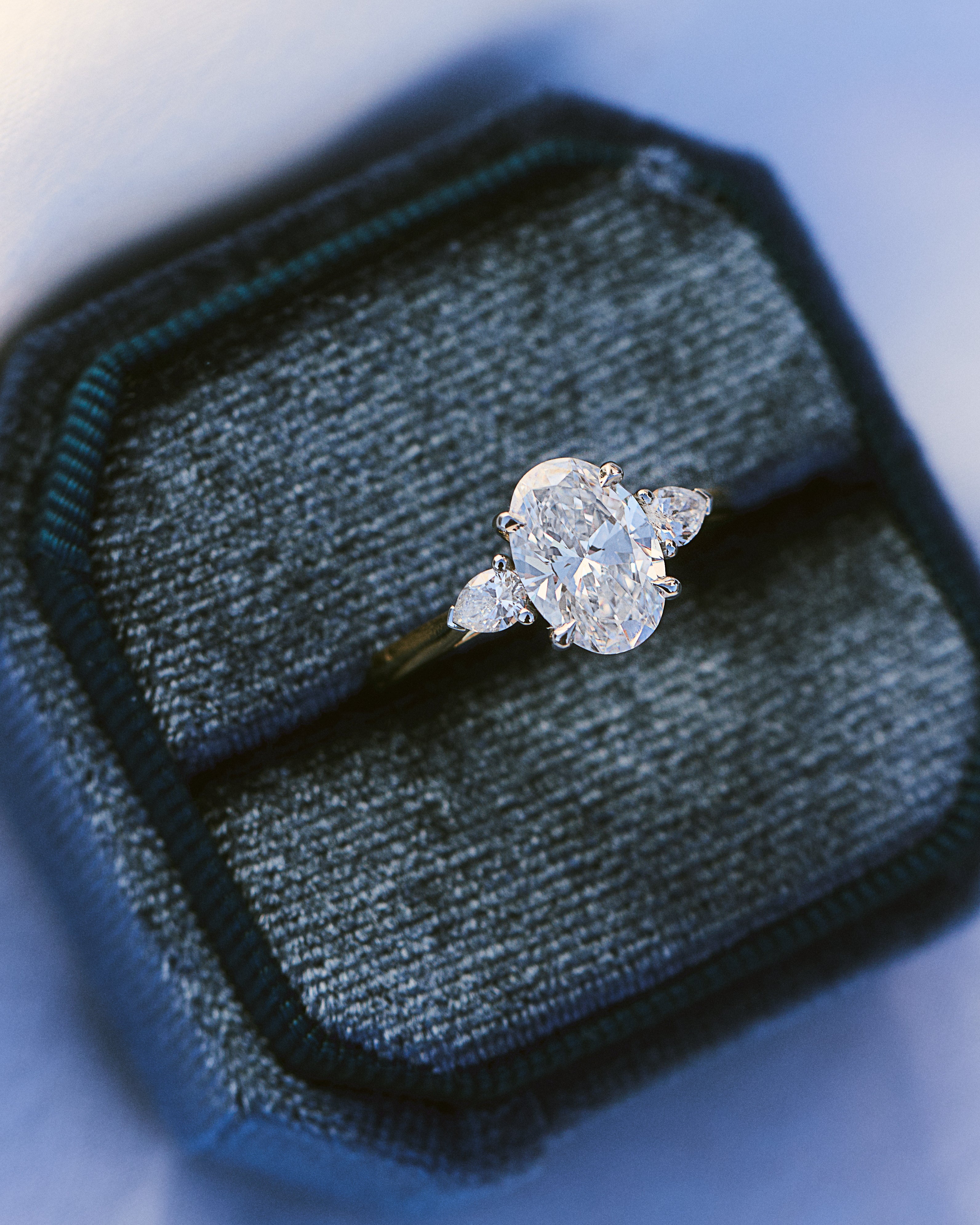 oval lab grown diamond yellow gold and platinum engagement ring